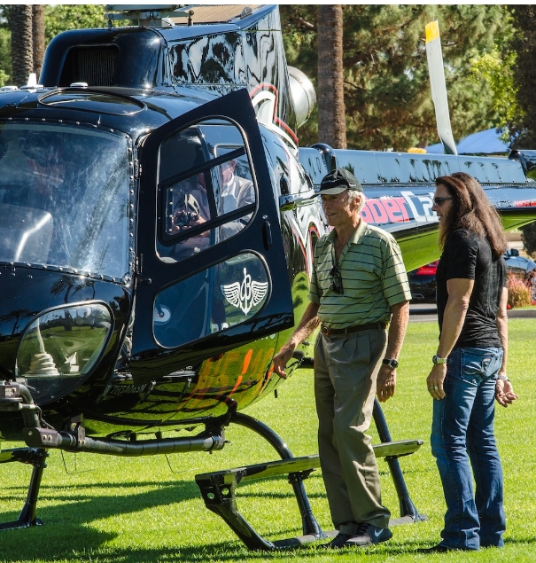 Clint Eastwood boarding a helicopter
